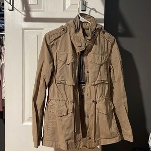 Beige Tommy Hilfiger, light. Awesome for the fall. Xs but can fit like a Small